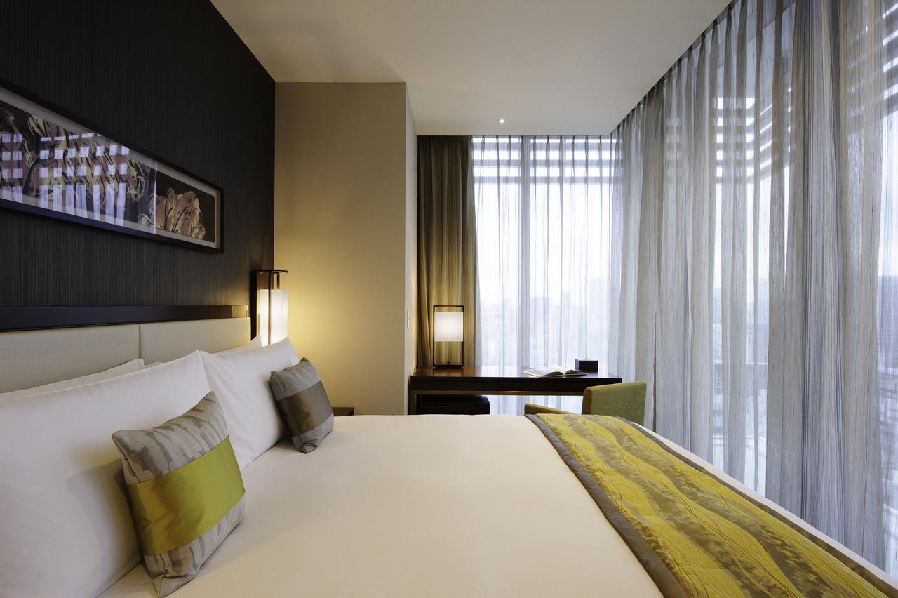 Готель Oakwood Premier Токіо Екстер'єр фото A bedroom at the hotel